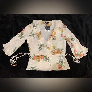 Beautiful wrap around top fromTop Shop! NWT!